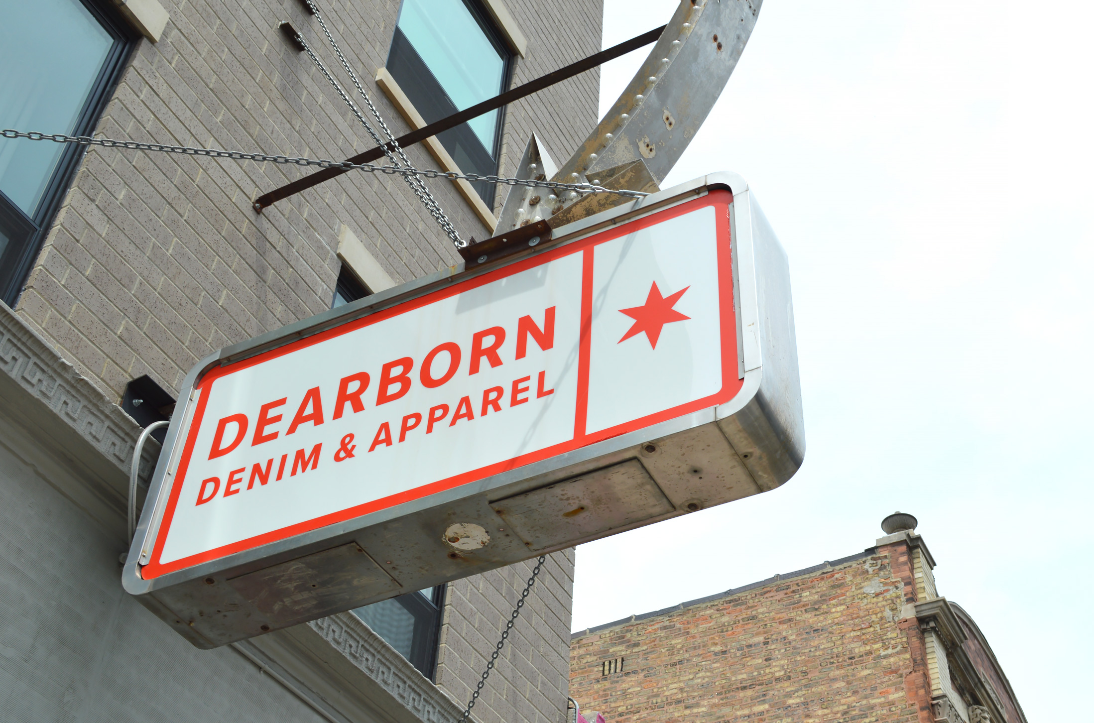 the Dearborn Denim sign hanging outside their Andersonville storefront