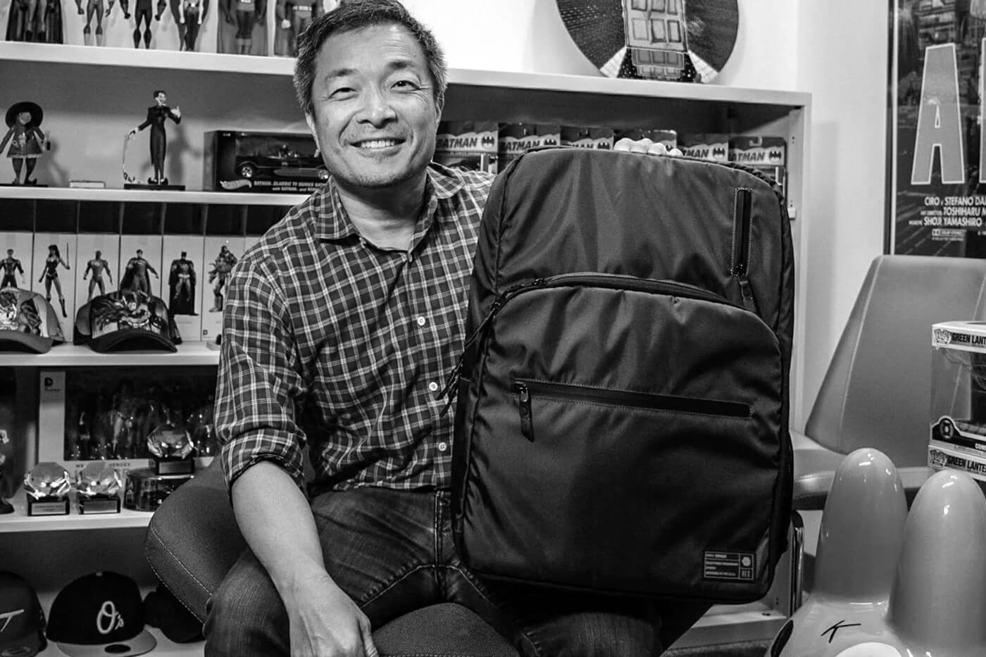 Jim Lee holding a HEX bag