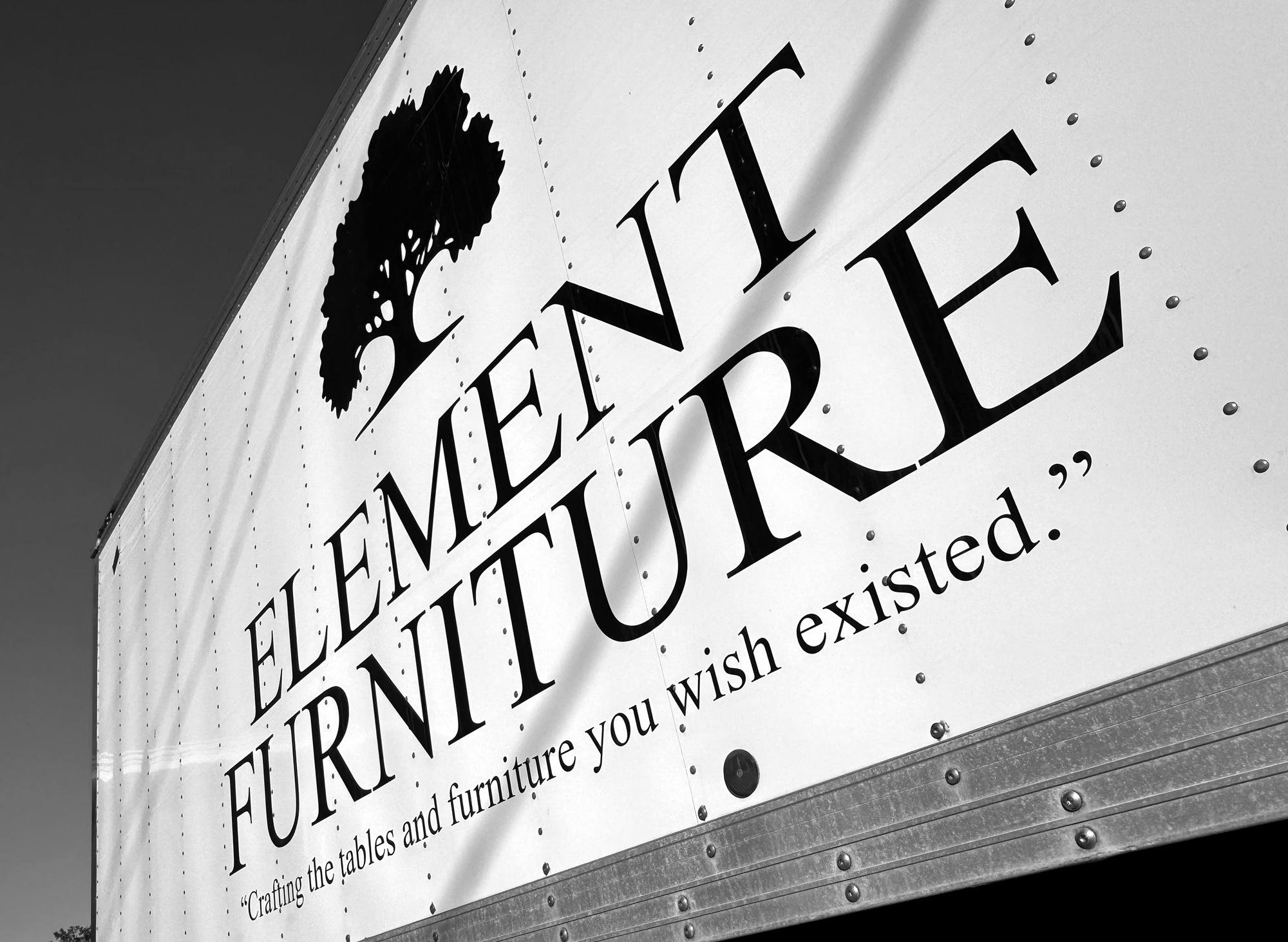 an Element Furniture delivery truck, with the 'Element Furniture' logo on its side